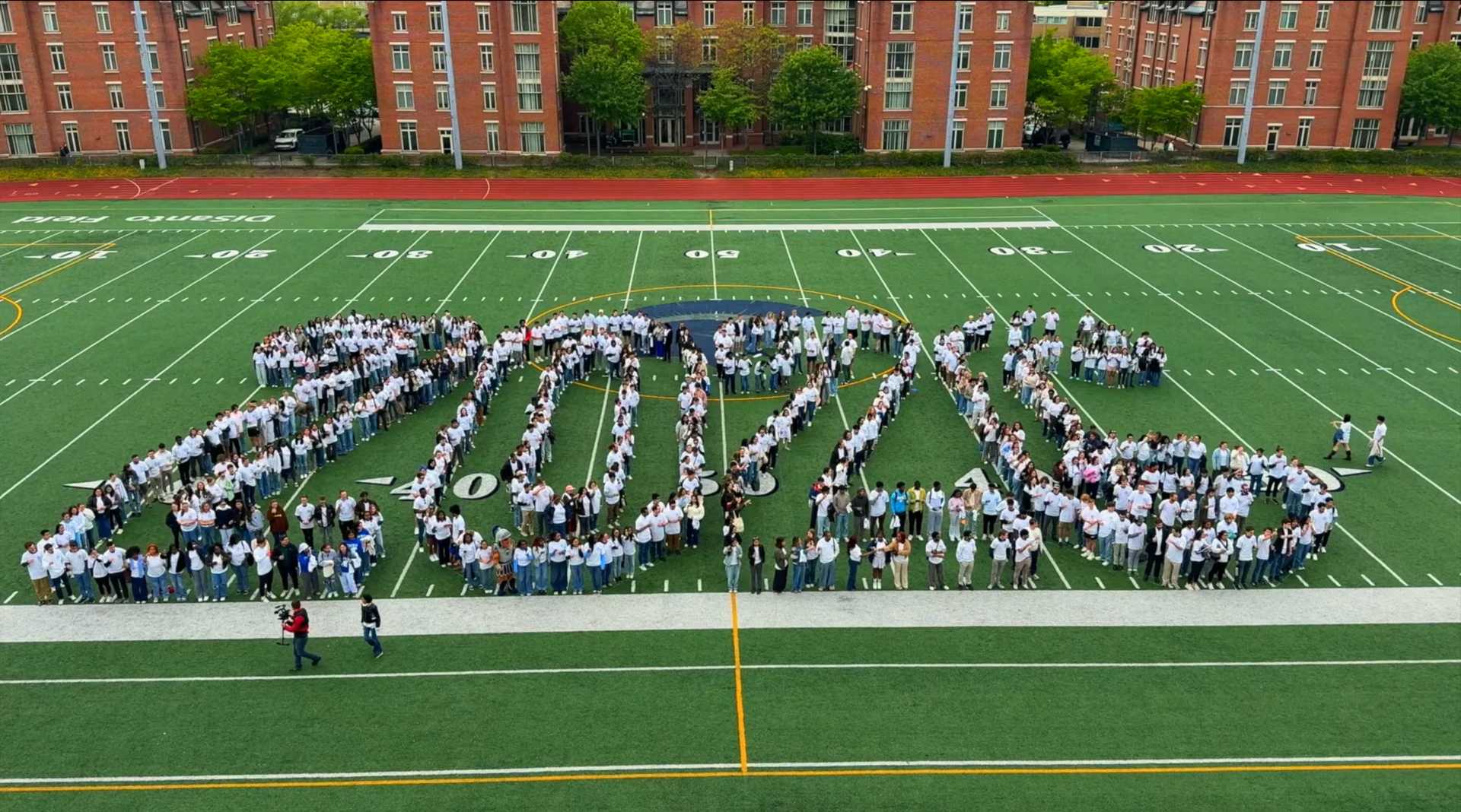 Aerial photo of Case Western Reserve University's class of 2026 forming the numbers 2026 on the football field
