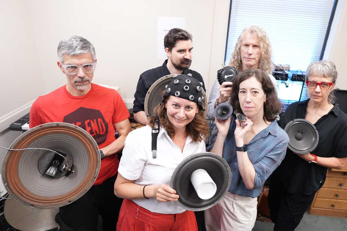The Brain Media Lab team of musicians, scientists, and engineers. Front row, from left: Francesca Brittan, PhD, Vera Tobin, PhD, and Kerry Richardson, MFA. Back row, from left: Steven Ciampaglia, EdD, Stephan Haluska, MFA, and Tracy Mortimer, a professional musician.